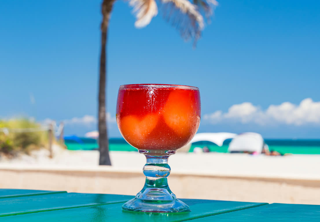 A drink by the beach at Señor Frog’s Cancun
