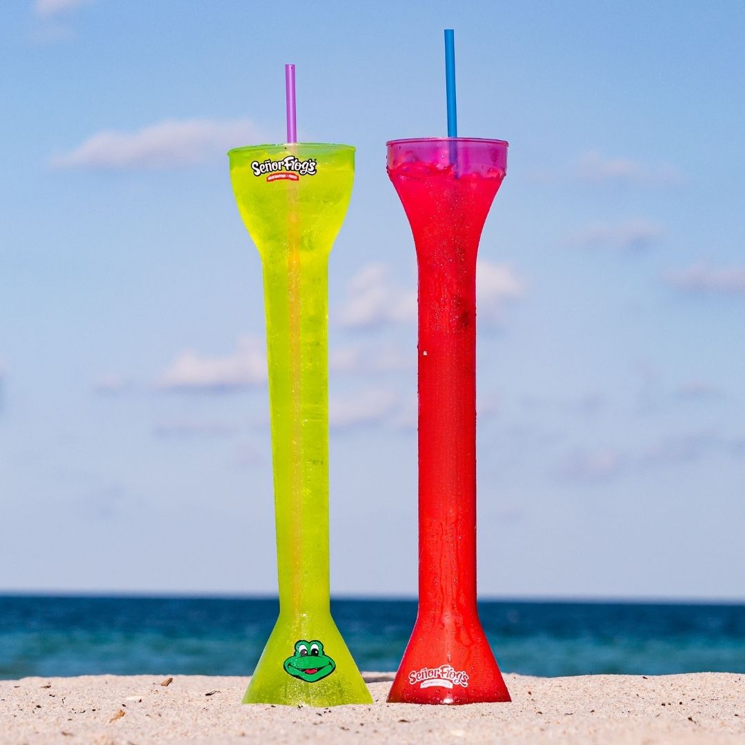 Two Señor Frog’s yard drinks on the sand at Fort Lauderdale beach