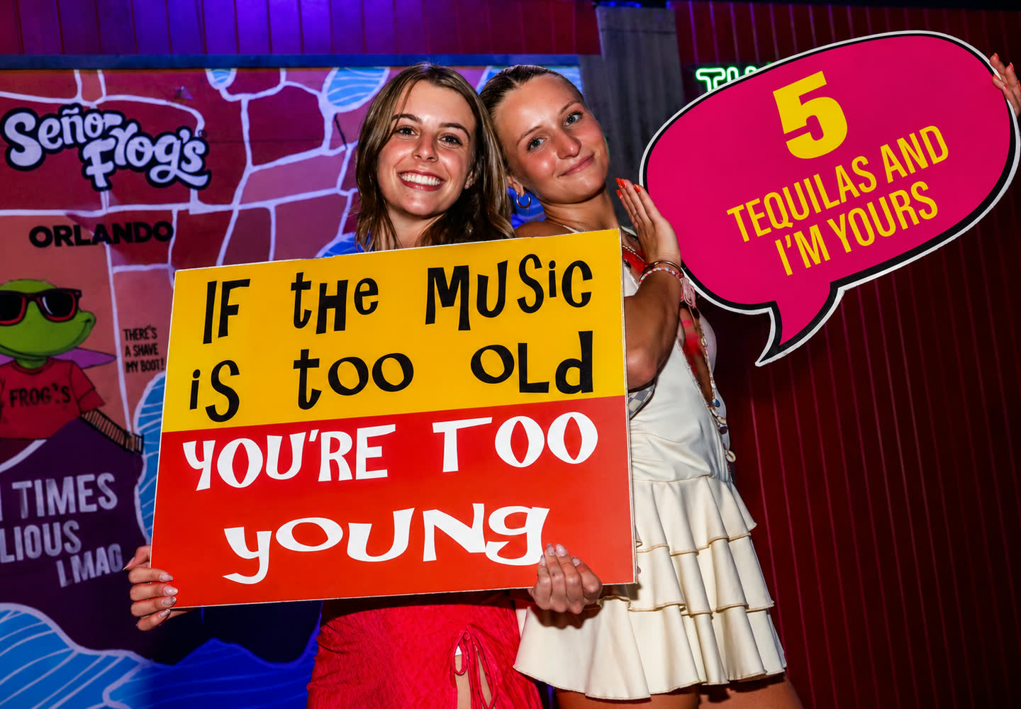 Guests with a party sign at Señor Frog’s Los Cabos Pier