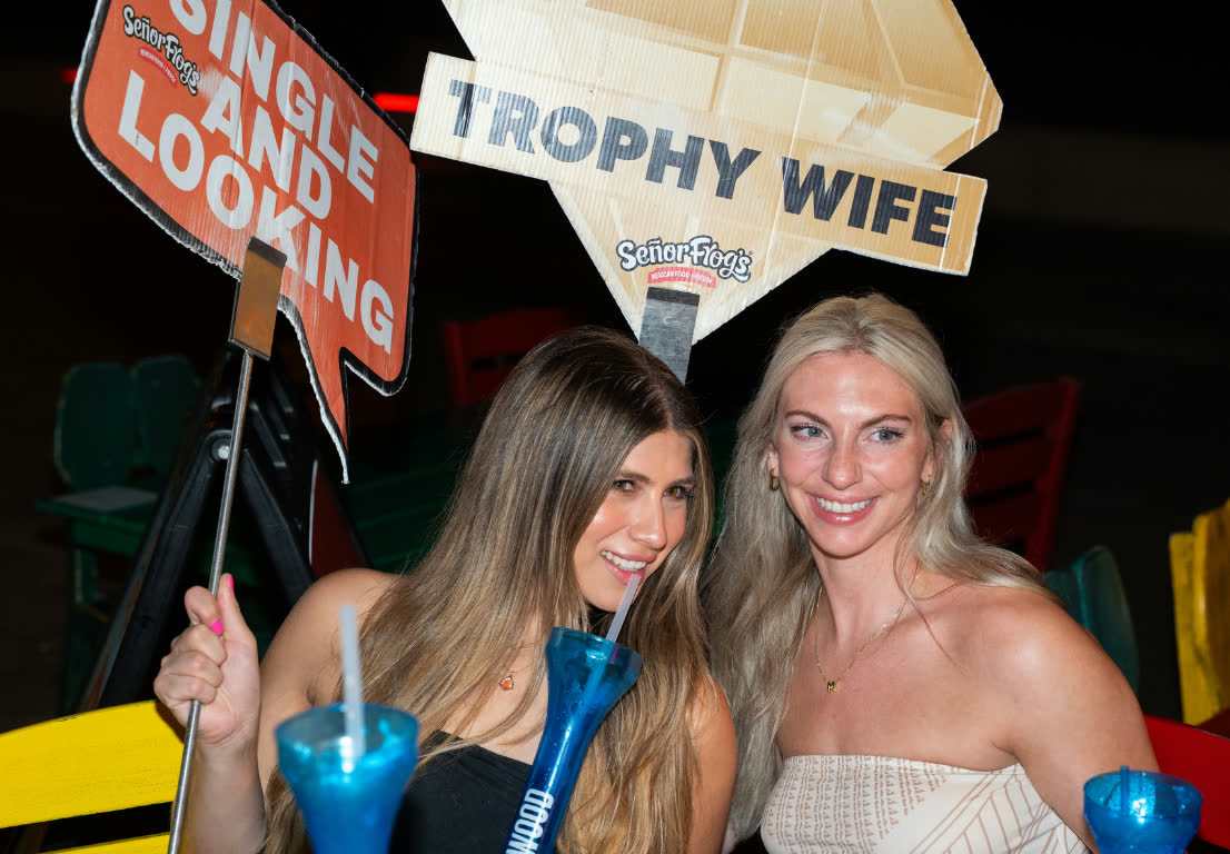 Guests with photo props at Señor Frog’s Myrtle Beach