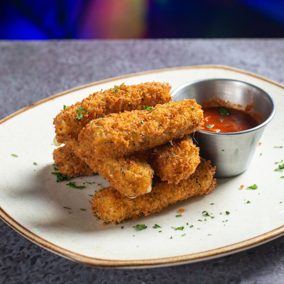 Breaded mozzarella sticks with marinara sauce at Señor Frog’s Playa del Carmen